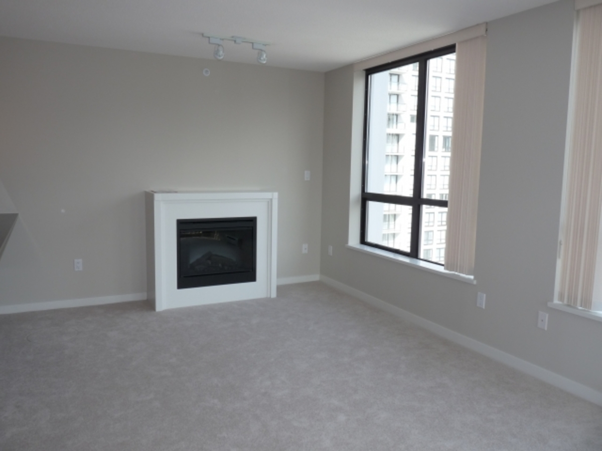 Living Room at 1002 - 2979 Glen Dr, Coquitlam Center, Coquitlam